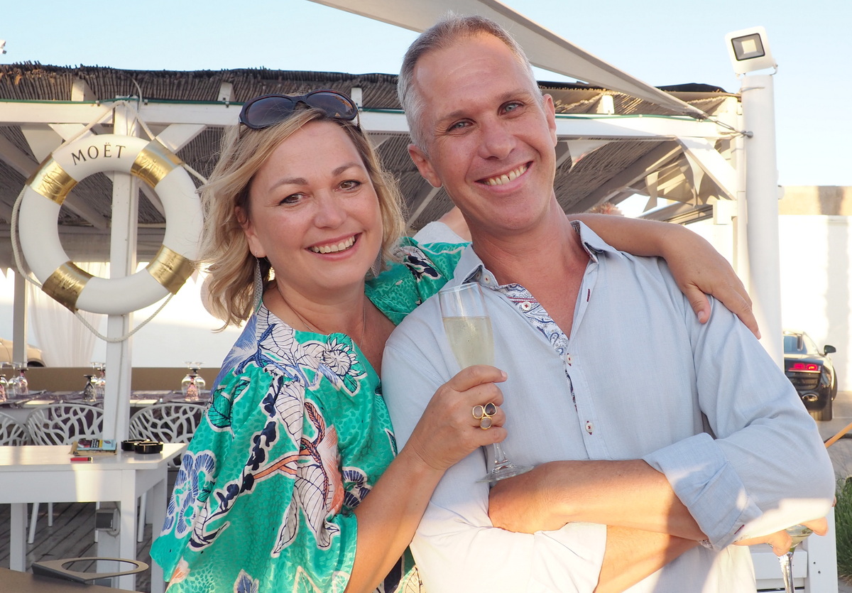 Alison and Alastair, founders of moving to Spain enjoying a glass of cava