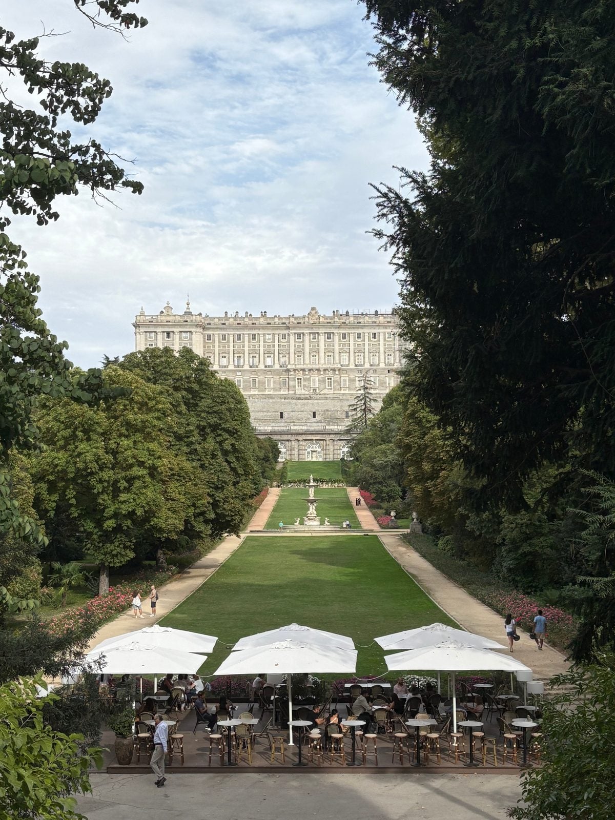 The Royal Palace of Madrid framed by trees from the formal Campo del Moro gardens below in the suburbs of Moncloa-Aravaca