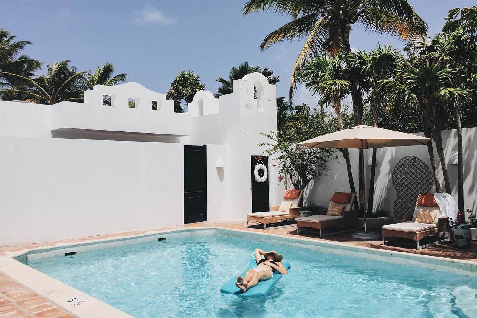a Spanish house with a pool